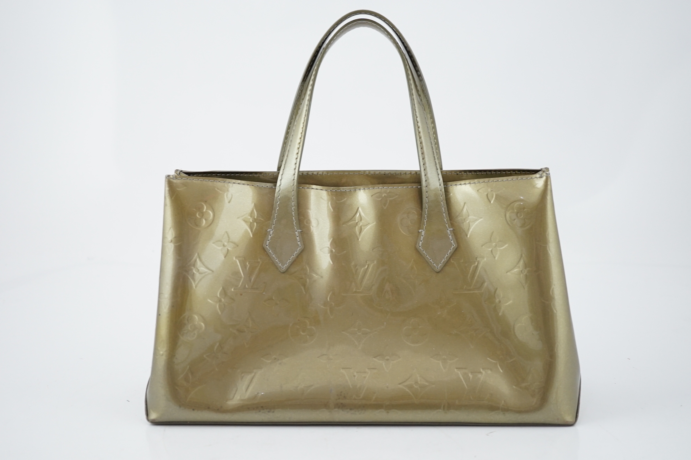 A Louis Vuitton gold metallic monogram tote bag, height 18cm, height to handle 29cm, width 31cm, depth 11.5cm